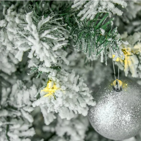 1. SnowFrost 9FT Pre-Lit Slim Christmas Tree